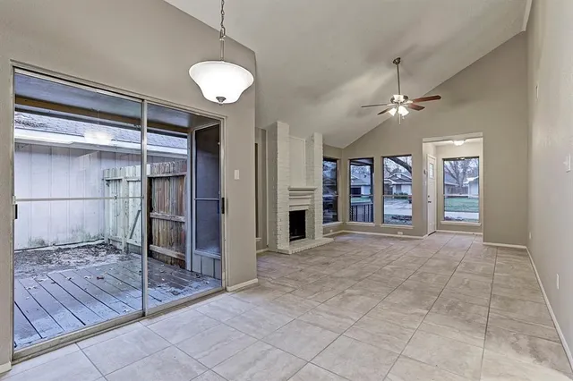 a view of livingroom with an empty space and window