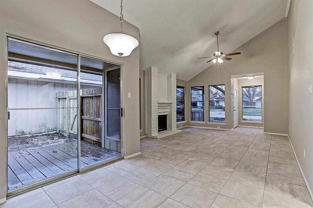 23322 Pebworth Place Spring, TX 77373 - Photo 4 of 10 a view of livingroom with an empty space and window