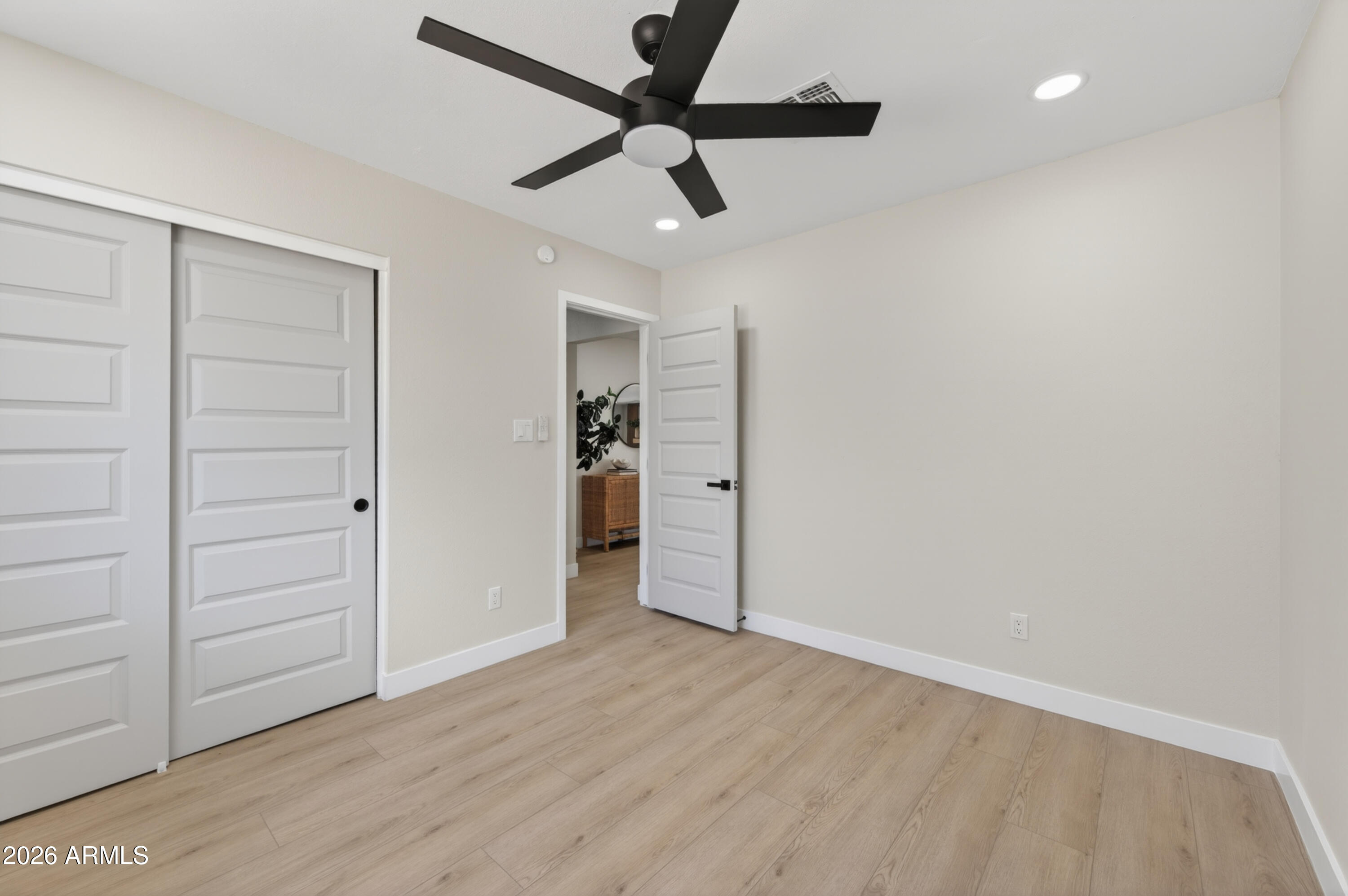 3422 South Terrace Road Tempe, AZ 85282 - Photo 24 of 43 wooden floor in an empty room