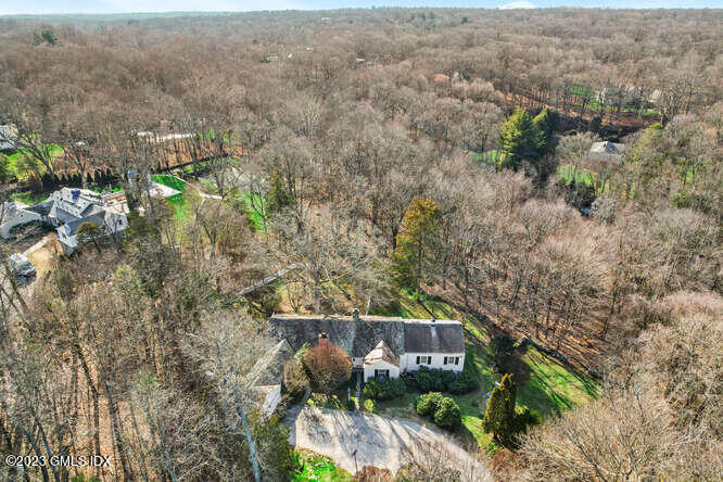 320 Cognewaugh Road Cos Cob, CT 06807 - Photo 2 of 38 an aerial view of residential house with outdoor space