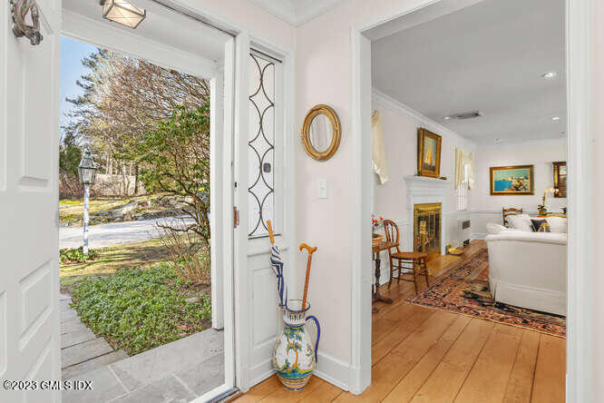 320 Cognewaugh Road Cos Cob, CT 06807 - Photo 3 of 38 a view of a livingroom with furniture and a window