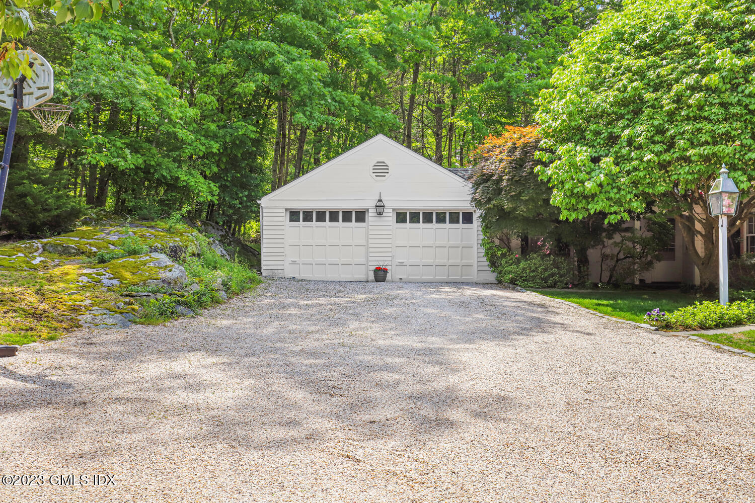 320 Cognewaugh Road Cos Cob, CT 06807 - Photo 35 of 38 a view of a house with a yard