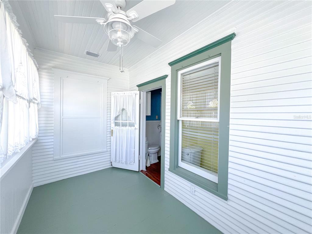 516 Northeast 4 Street Gainesville, FL 32601 - Photo 40 of 57 a view of a livingroom with wooden floor and staircase