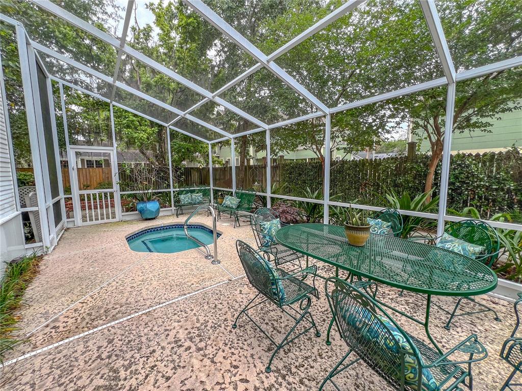516 Northeast 4 Street Gainesville, FL 32601 - Photo 4 of 57 a view of a chair and table in the backyard