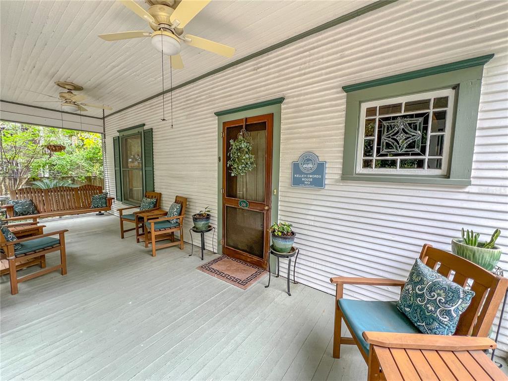 516 Northeast 4 Street Gainesville, FL 32601 - Photo 7 of 57 a view of a livingroom with furniture and a porch