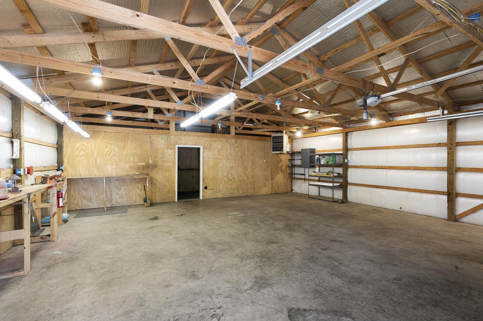 7205 Highland Road Portland, TN 37148 - Photo 5 of 29 a view of empty room with wooden ceiling