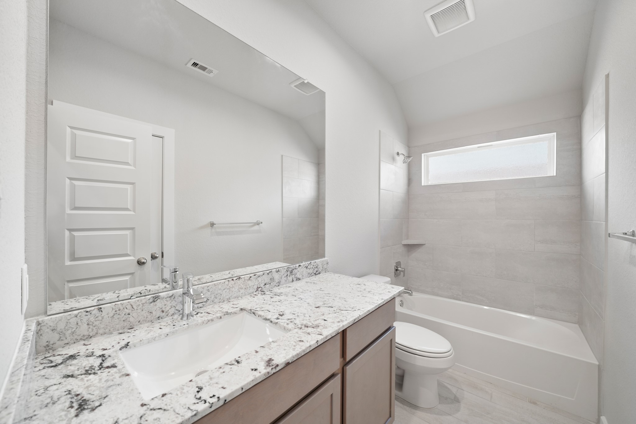 44 Shining Pt Drive Waller, TX 77484 - Photo 17 of 36 a bathroom with a granite countertop sink toilet and shower