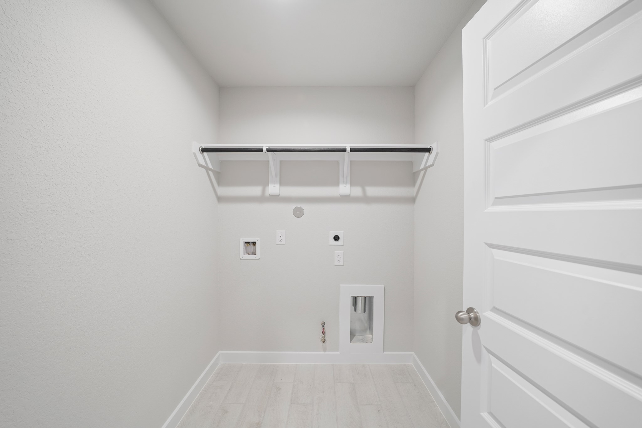 44 Shining Pt Drive Waller, TX 77484 - Photo 19 of 36 a view of small space with racks on the wall