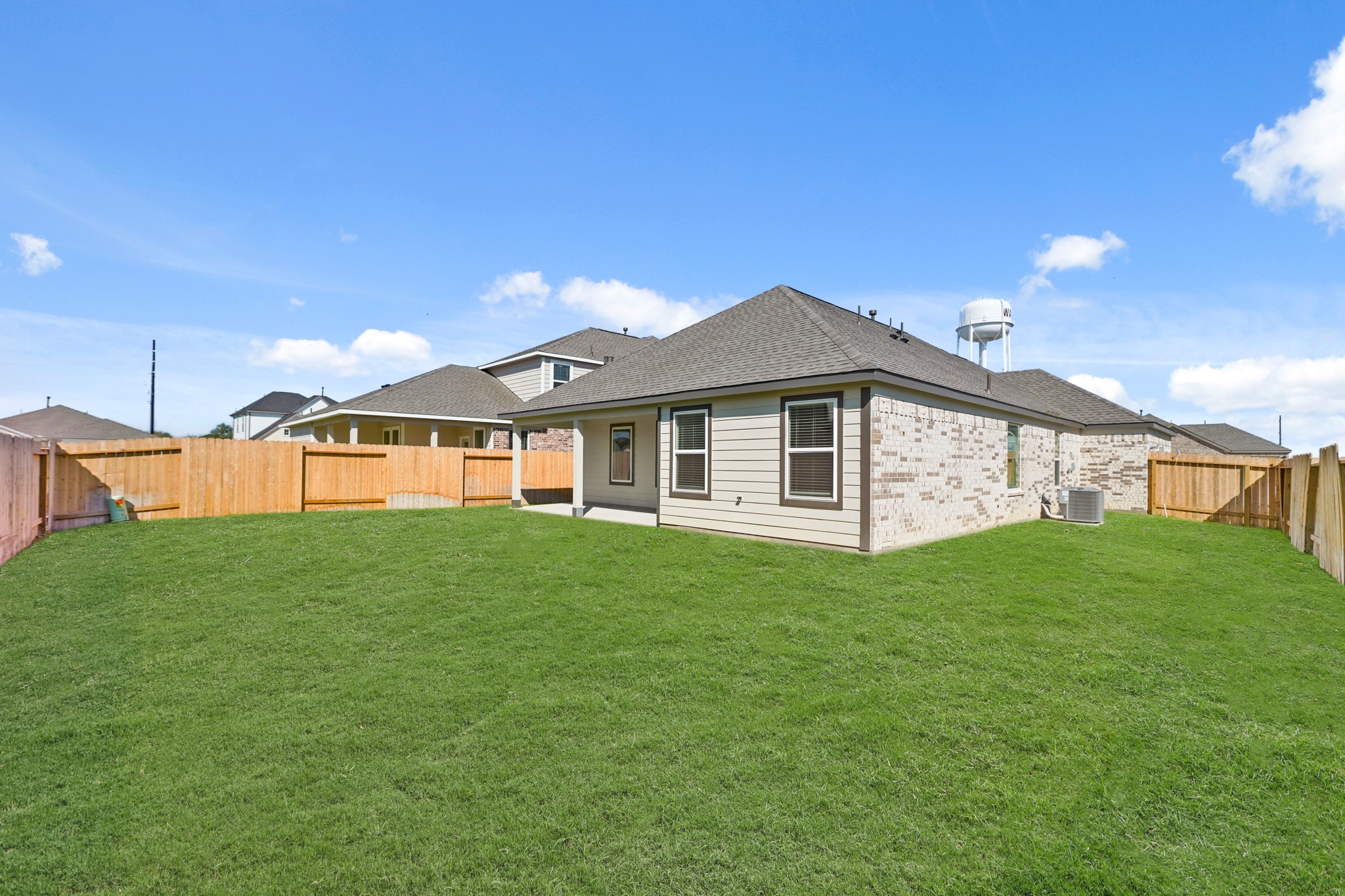 44 Shining Pt Drive Waller, TX 77484 - Photo 24 of 36 a view of a house with a big yard