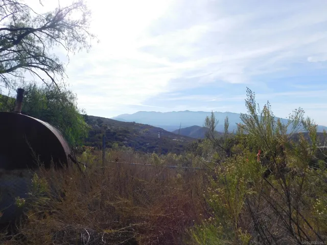 a view of a lake with a mountain in the background