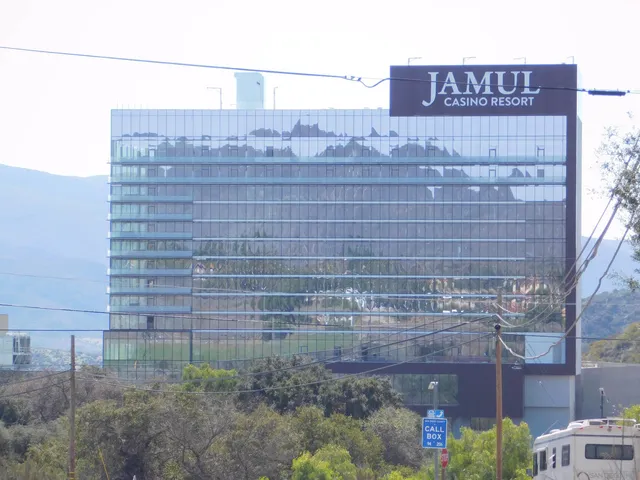 a brick building with a street sign on it