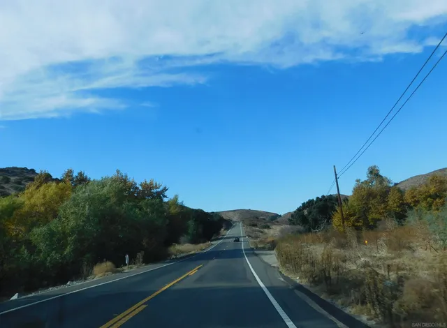 a view of a city street from a balcony