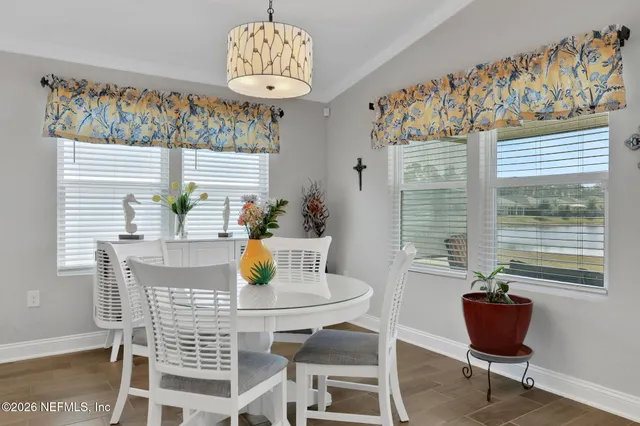 a view of a livingroom with furniture and front door