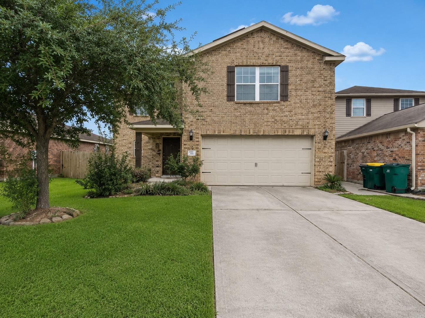 341 Comanche Plains Road La Marque, TX 77568 - Photo 1 of 17 a front view of a house with a yard and garage