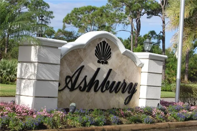 an aerial view of residential houses with city view