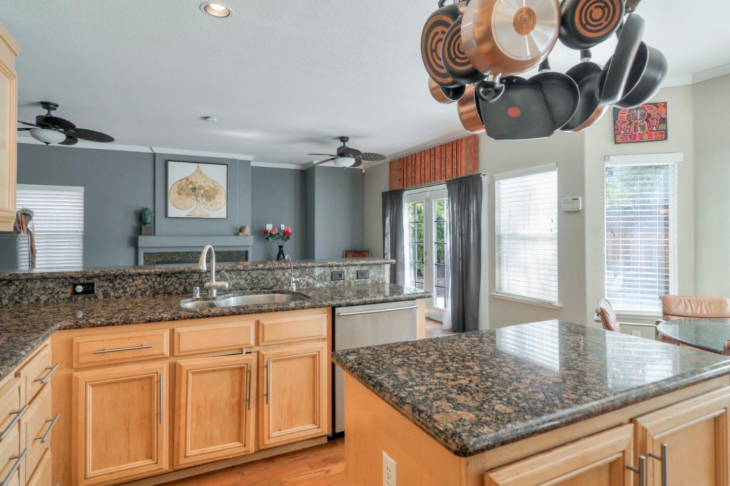 9402 Rodeo Drive Gilroy, CA 95020 - Photo 11 of 39 a kitchen with stainless steel appliances granite countertop a sink and a granite counter tops