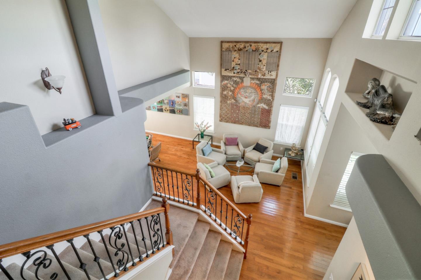 9402 Rodeo Drive Gilroy, CA 95020 - Photo 18 of 39 a living room with furniture and a wooden floor