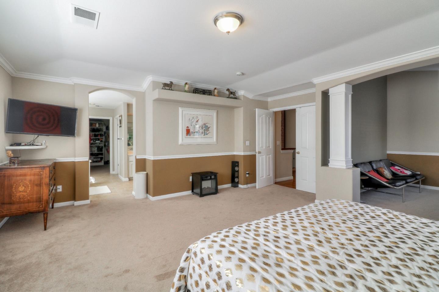 9402 Rodeo Drive Gilroy, CA 95020 - Photo 22 of 39 a bedroom with furniture and a couch