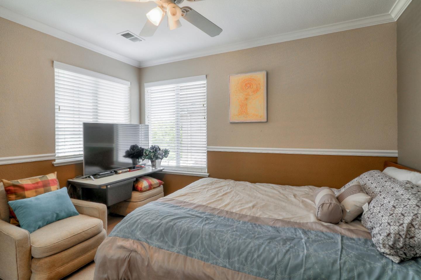 9402 Rodeo Drive Gilroy, CA 95020 - Photo 23 of 39 a bedroom with two beds and a window
