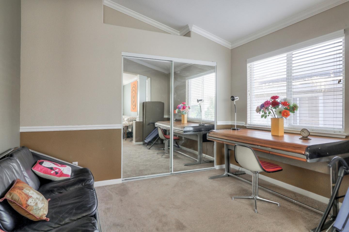 9402 Rodeo Drive Gilroy, CA 95020 - Photo 26 of 39 a room with furniture and a potted plant