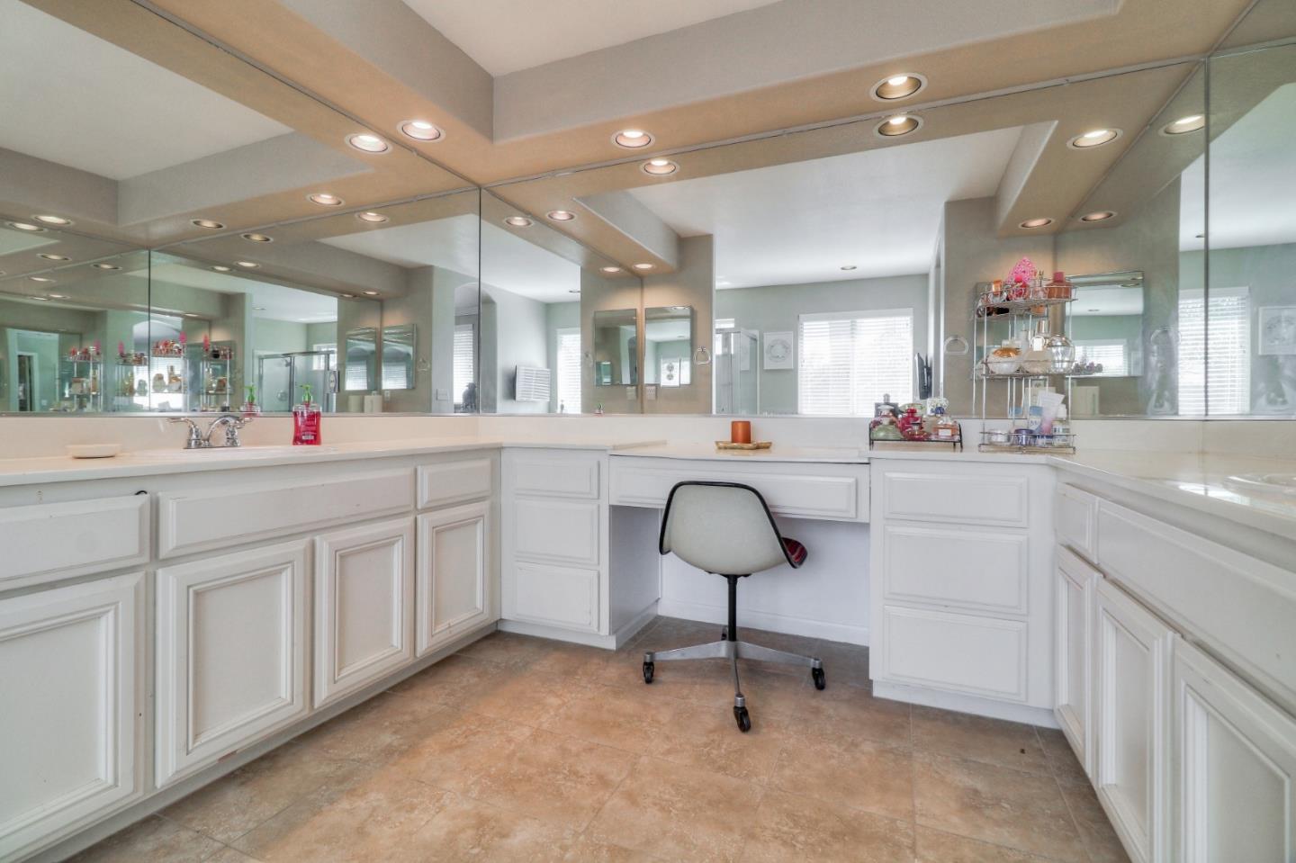 9402 Rodeo Drive Gilroy, CA 95020 - Photo 28 of 39 a kitchen with counter top space cabinets and a sink
