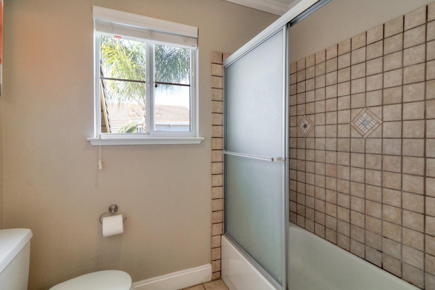 9402 Rodeo Drive Gilroy, CA 95020 - Photo 31 of 39 a bathroom with a shower and toilet