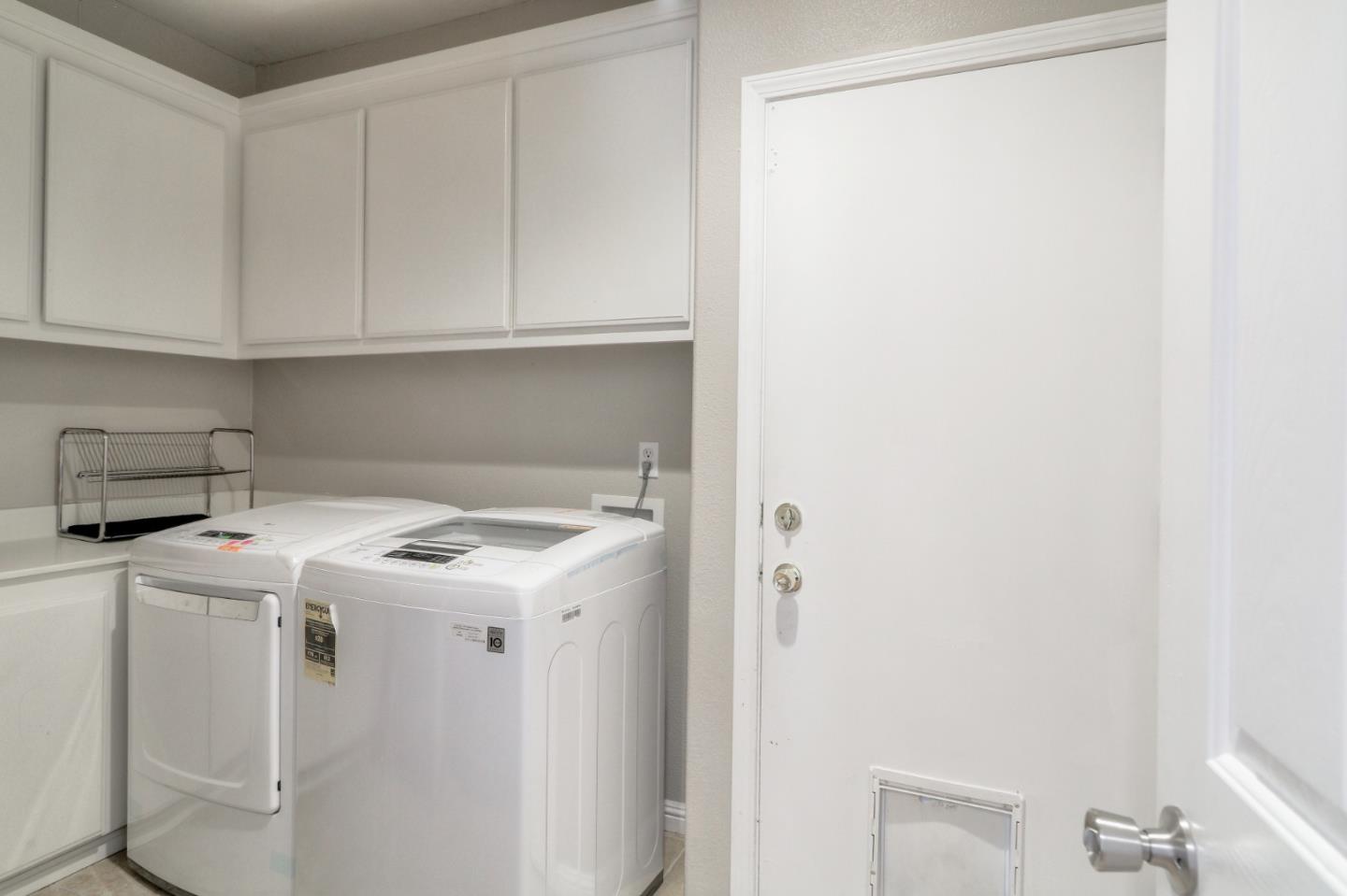 9402 Rodeo Drive Gilroy, CA 95020 - Photo 33 of 39 a utility room with dryer and washer
