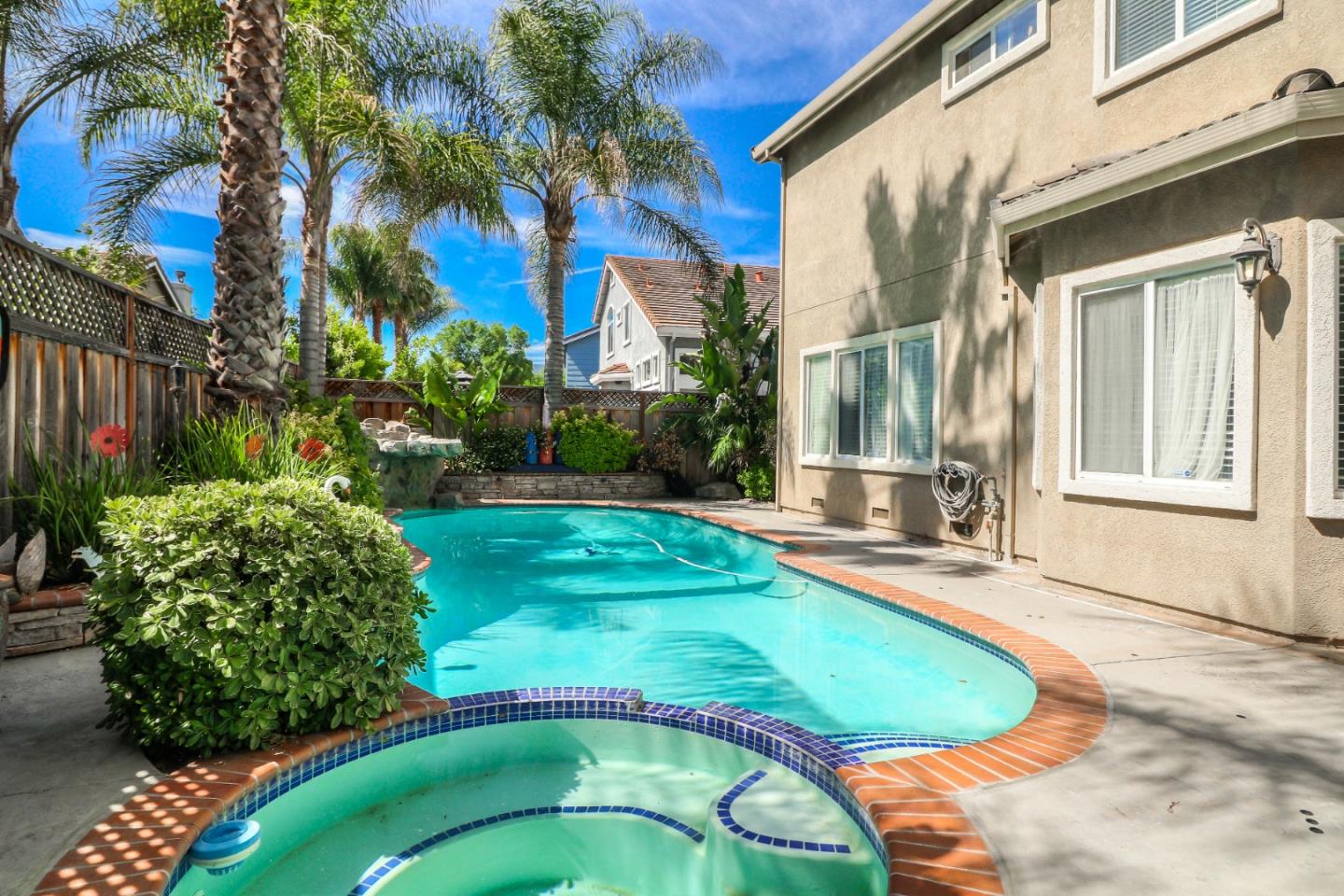 9402 Rodeo Drive Gilroy, CA 95020 - Photo 36 of 39 a view of a house with a swimming pool