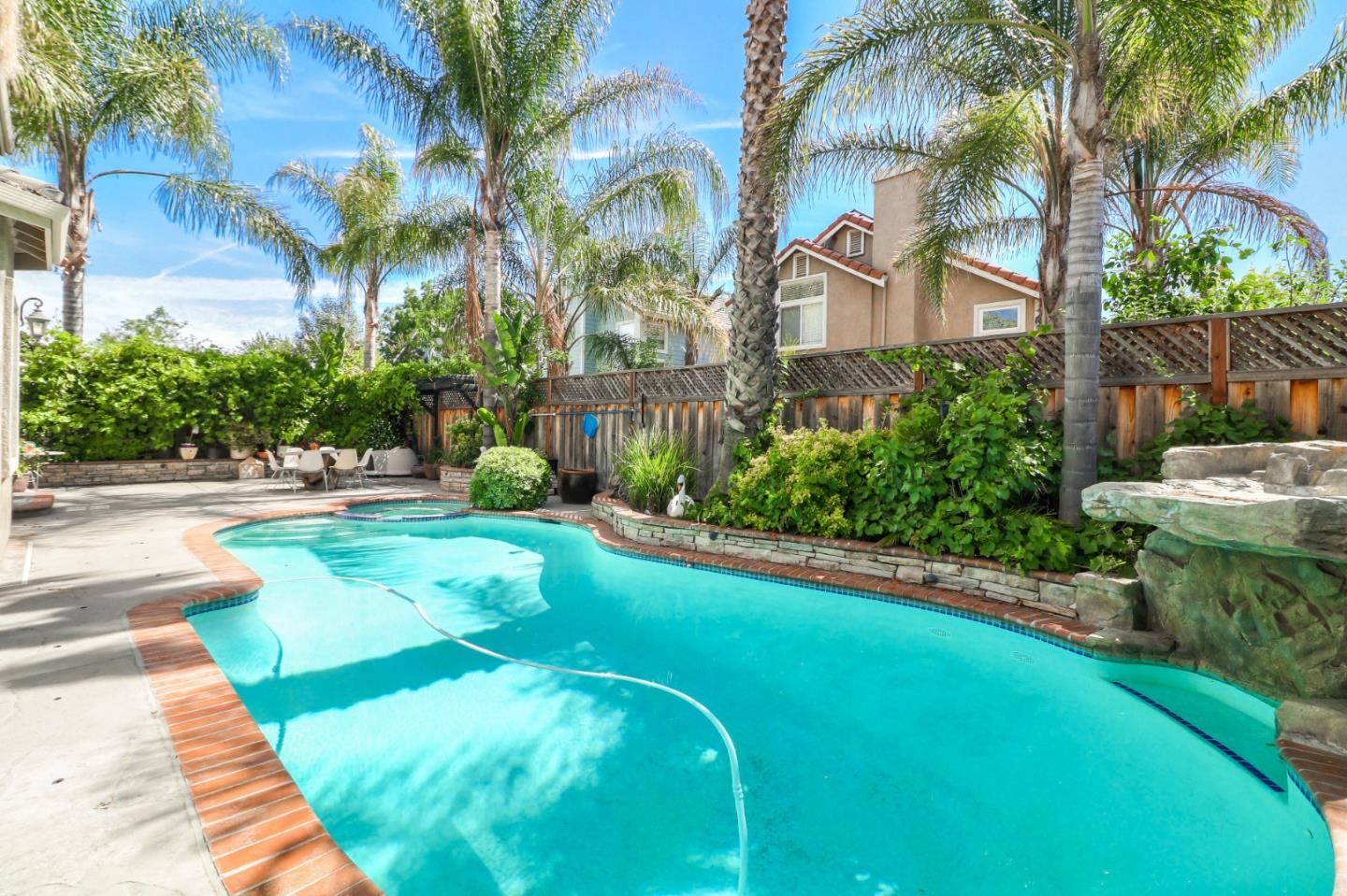 9402 Rodeo Drive Gilroy, CA 95020 - Photo 37 of 39 a backyard of a house with lots of green space