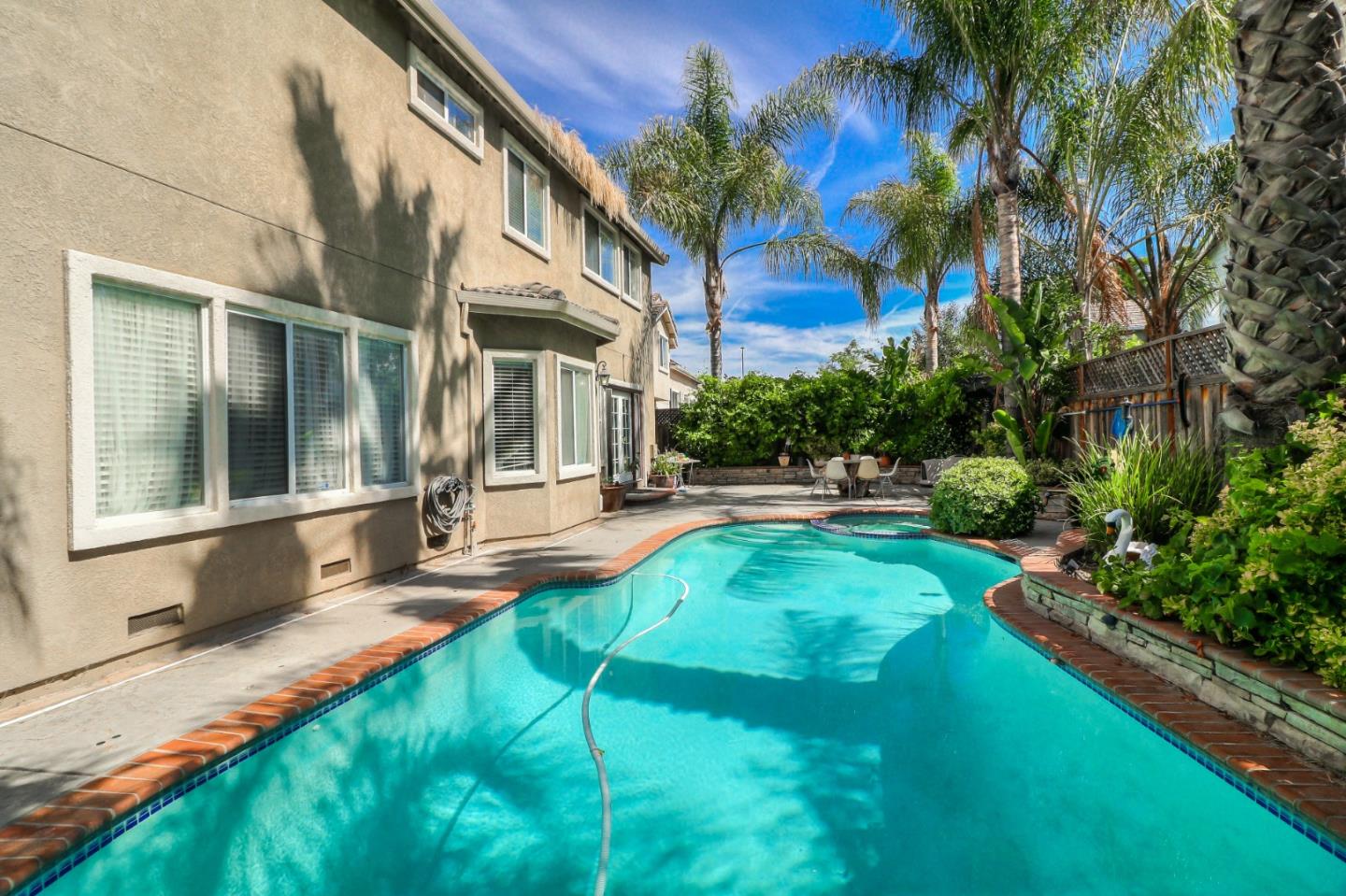 9402 Rodeo Drive Gilroy, CA 95020 - Photo 38 of 39 a view of an house with backyard porch and patio