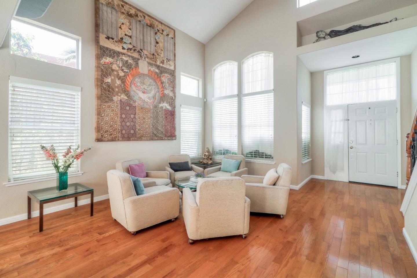 9402 Rodeo Drive Gilroy, CA 95020 - Photo 4 of 39 a living room with furniture and a large window