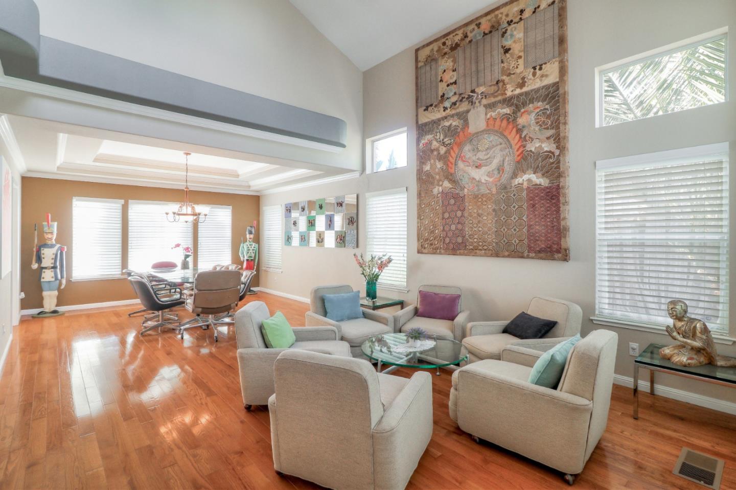 9402 Rodeo Drive Gilroy, CA 95020 - Photo 6 of 39 a living room with fireplace furniture and a large window