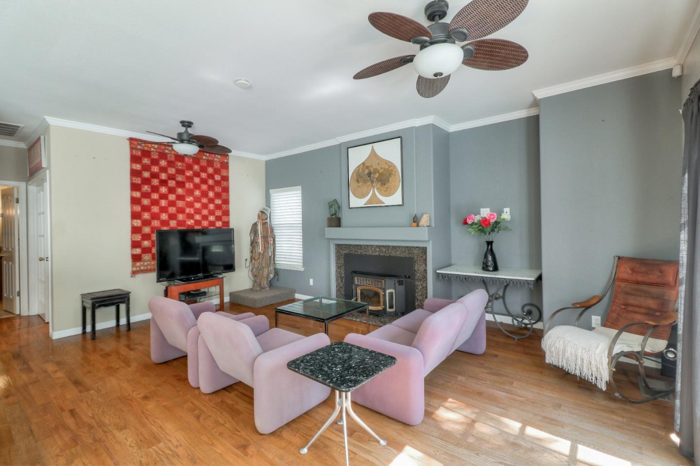 9402 Rodeo Drive Gilroy, CA 95020 - Photo 7 of 39 a living room with furniture and a fireplace