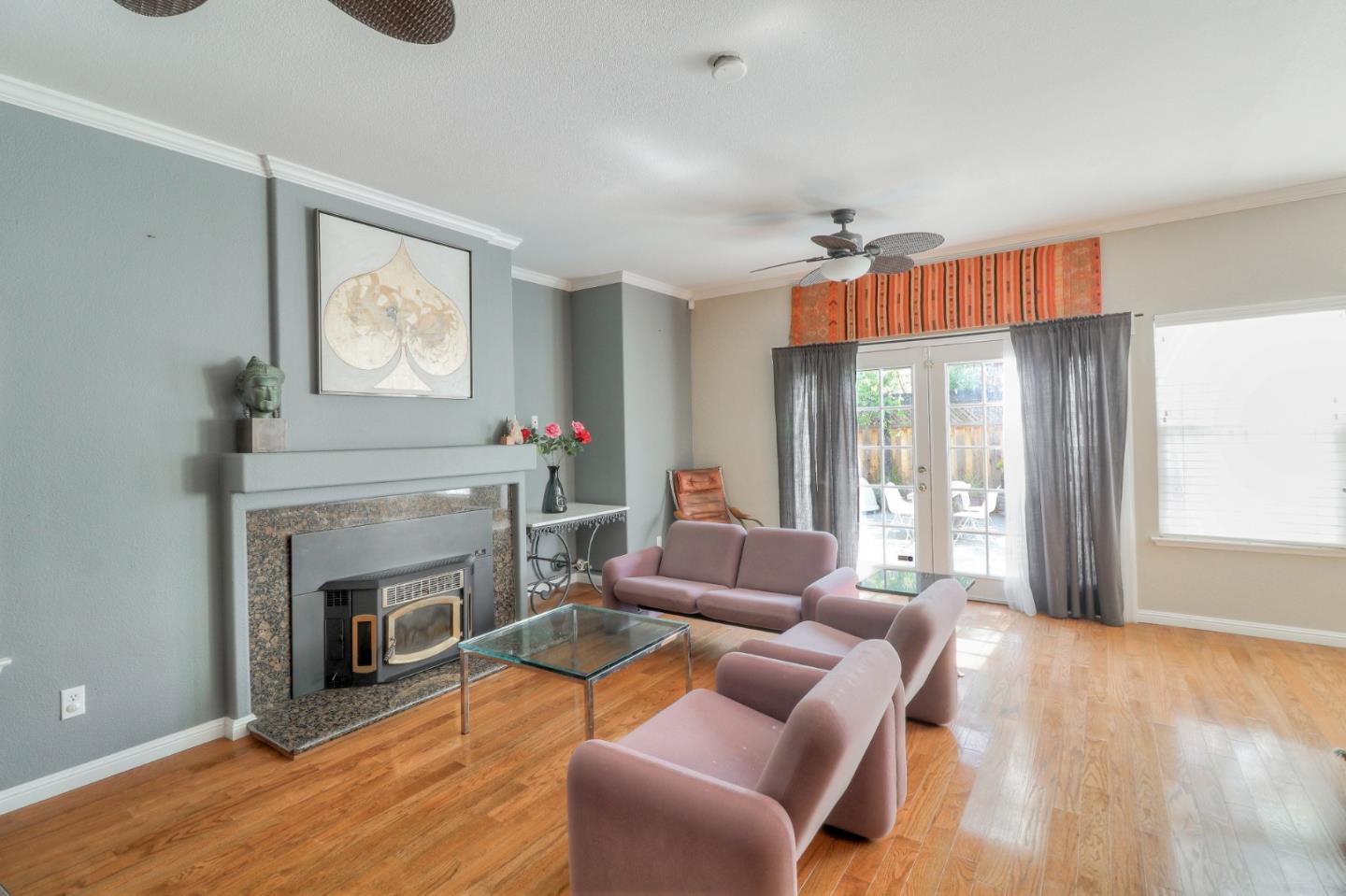 9402 Rodeo Drive Gilroy, CA 95020 - Photo 8 of 39 a living room with furniture and a fireplace