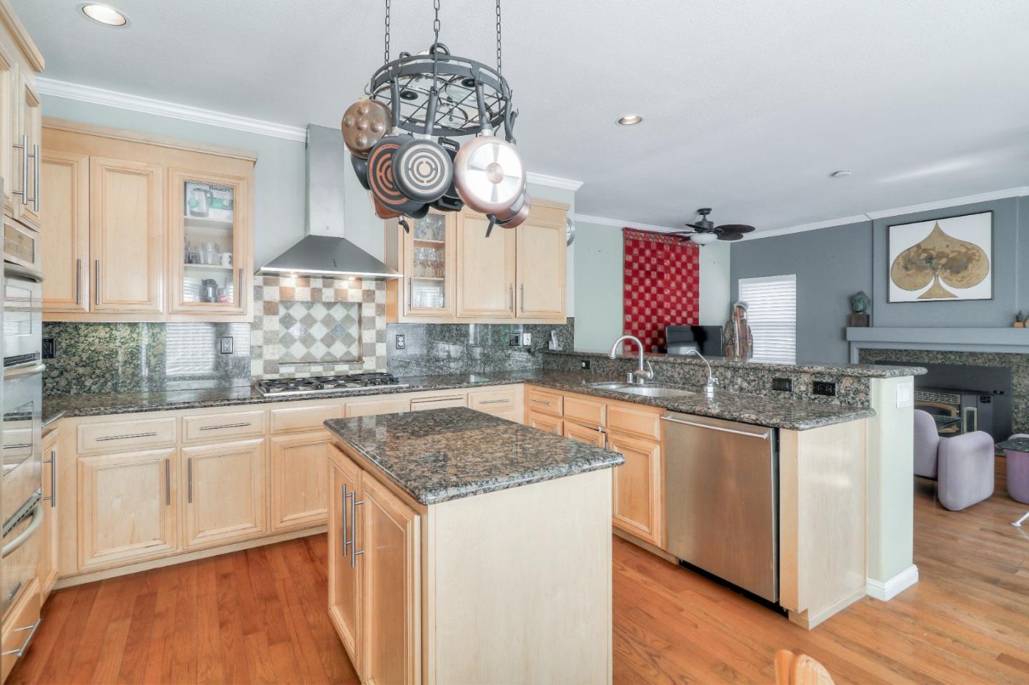 9402 Rodeo Drive Gilroy, CA 95020 - Photo 10 of 39 a kitchen with stainless steel appliances granite countertop a stove and a sink