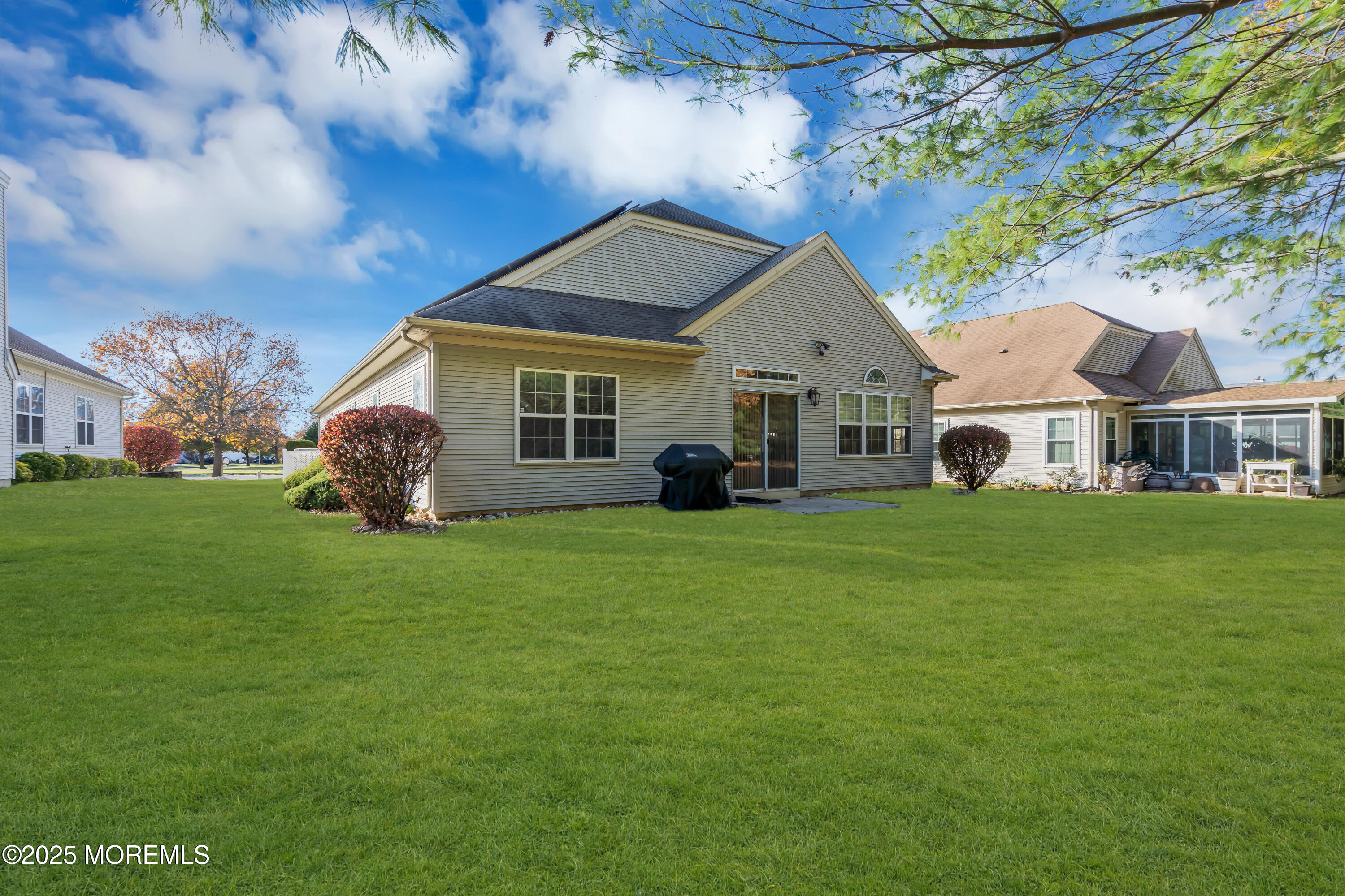 60 Eleanor Road Manchester Township, NJ 08759 - Photo 21 of 45 a front view of house with yard and green space