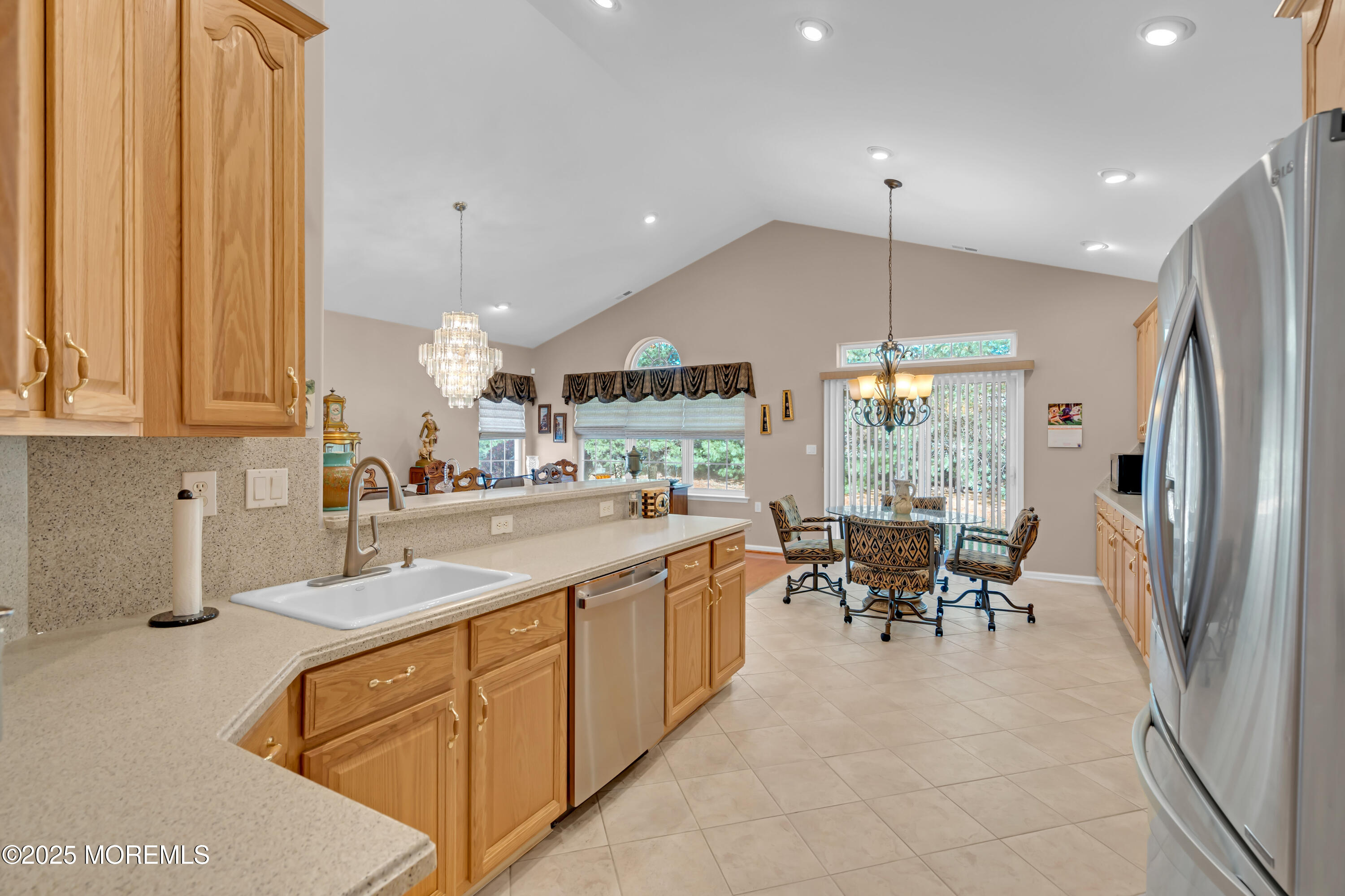 60 Eleanor Road Manchester Township, NJ 08759 - Photo 23 of 45 a kitchen with stainless steel appliances granite countertop sink refrigerator and cabinets