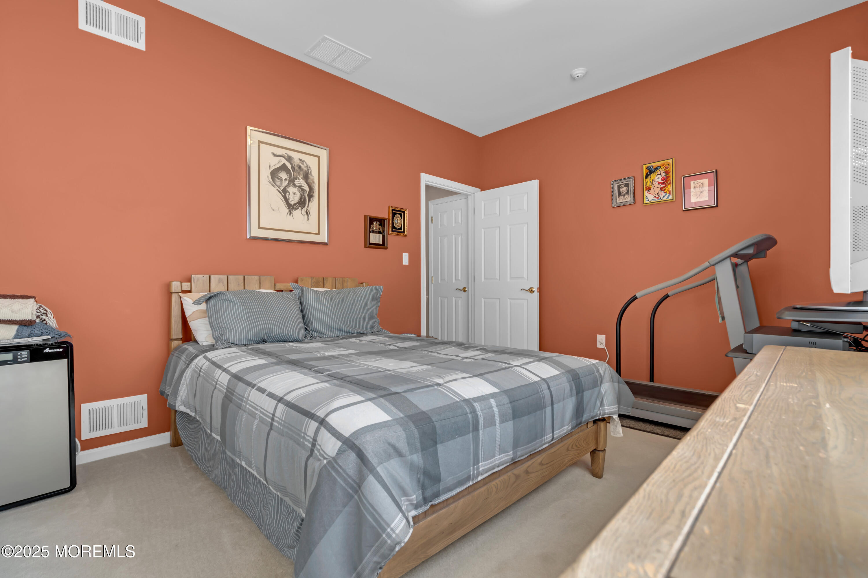 60 Eleanor Road Manchester Township, NJ 08759 - Photo 27 of 45 a bedroom with bed and wooden floor