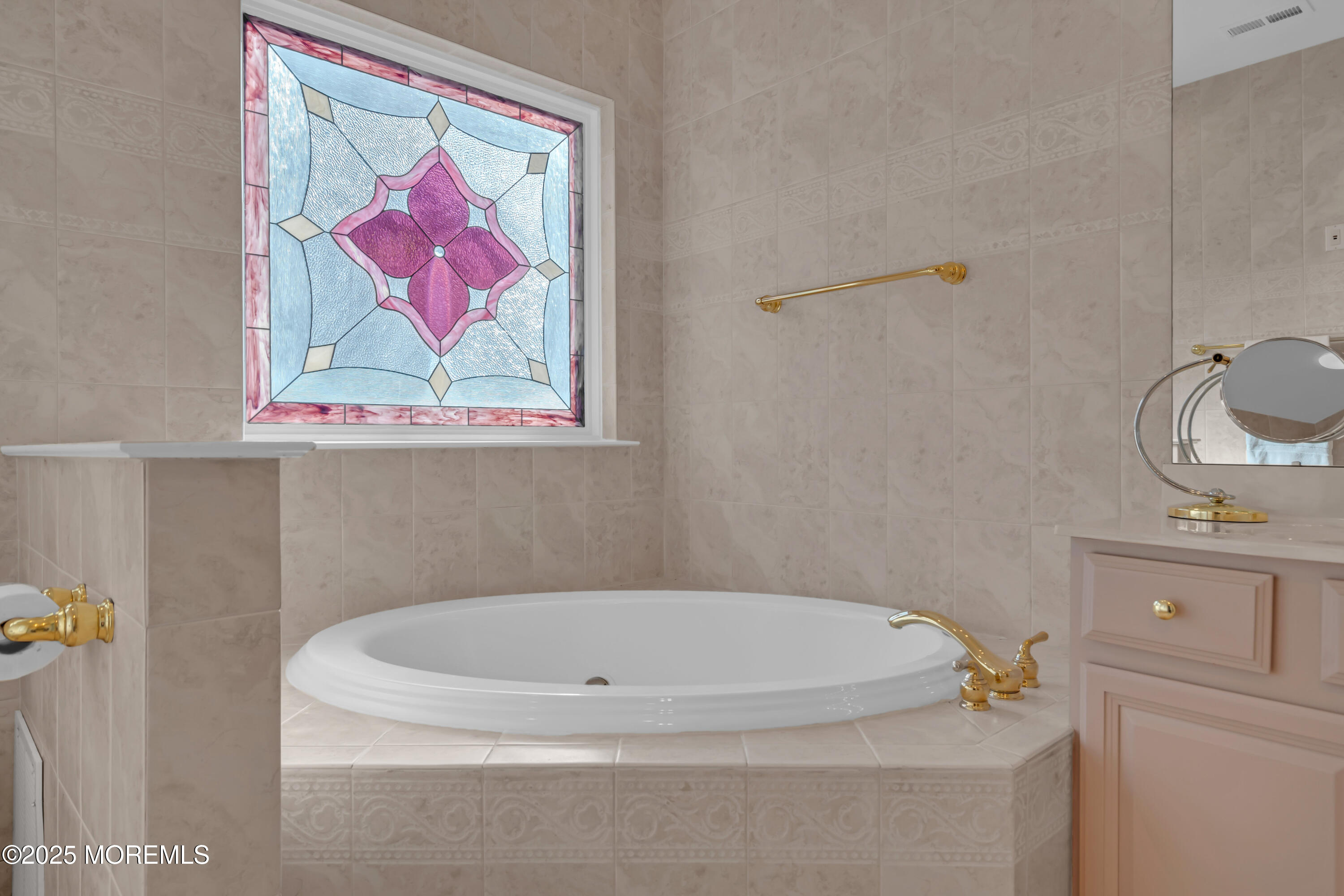 60 Eleanor Road Manchester Township, NJ 08759 - Photo 39 of 45 a bathroom with a tub and sink