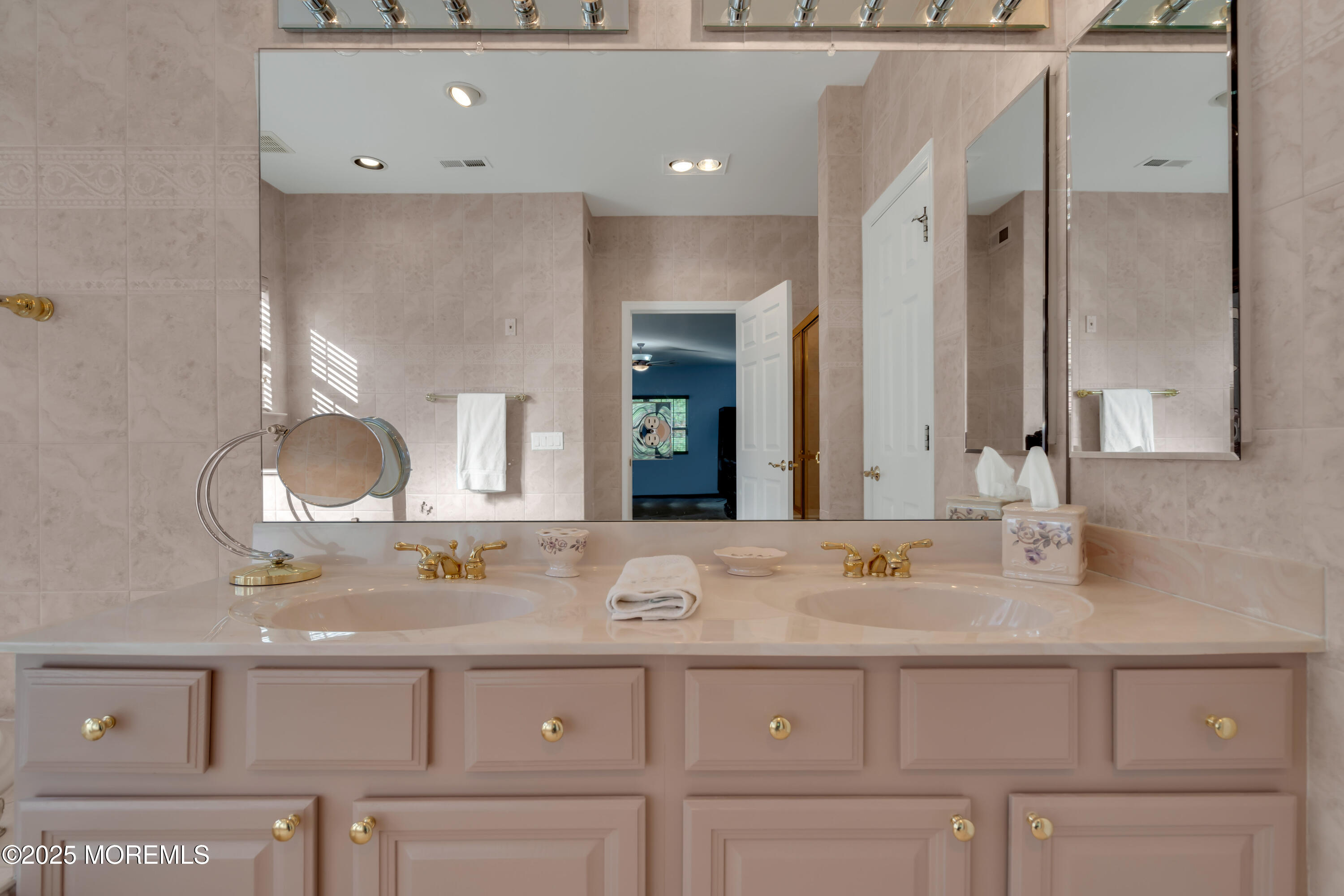 60 Eleanor Road Manchester Township, NJ 08759 - Photo 43 of 45 a bathroom with a sink and a mirror