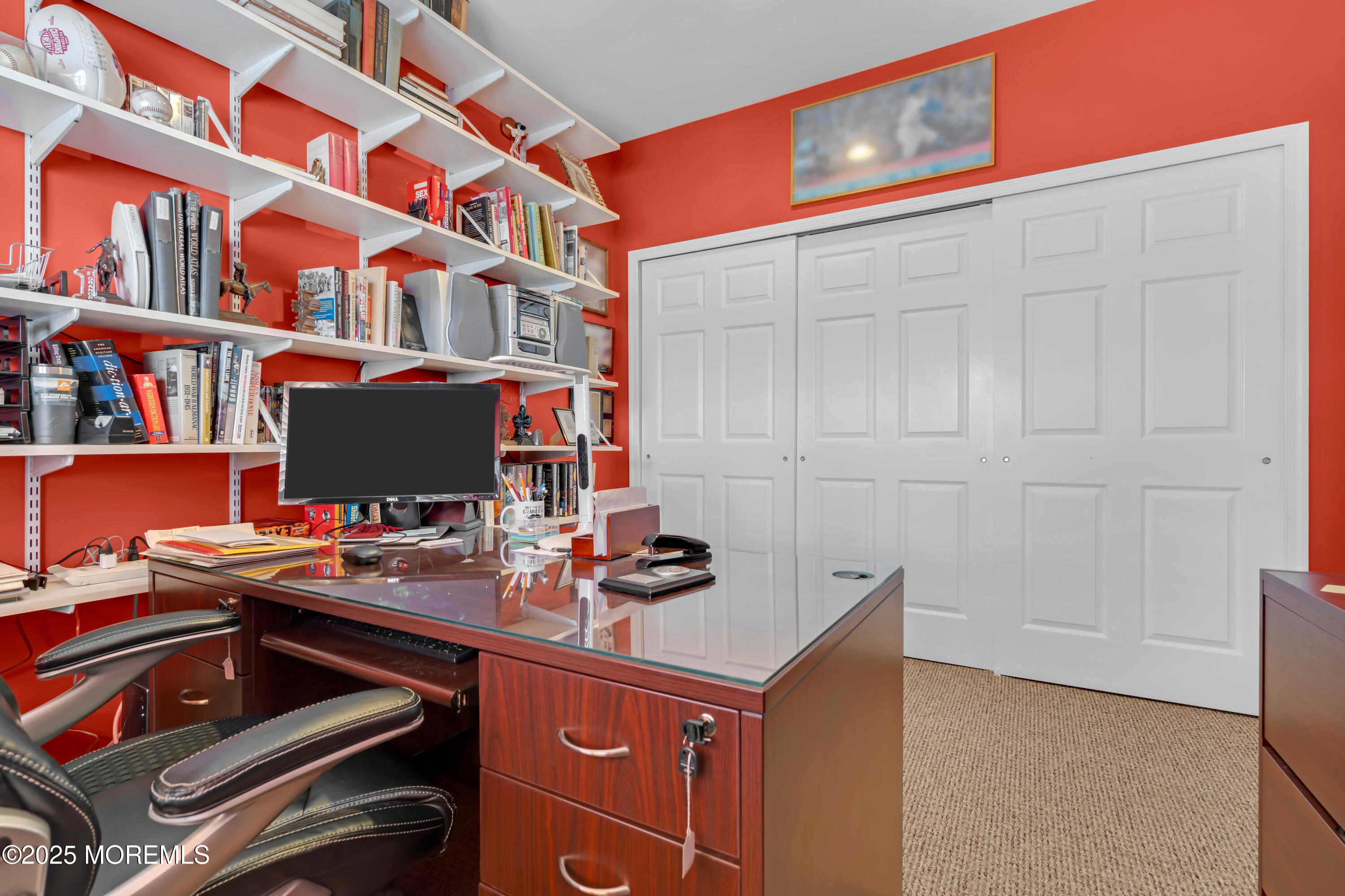 60 Eleanor Road Manchester Township, NJ 08759 - Photo 5 of 45 a work place with a computer on a desk and bookshelf