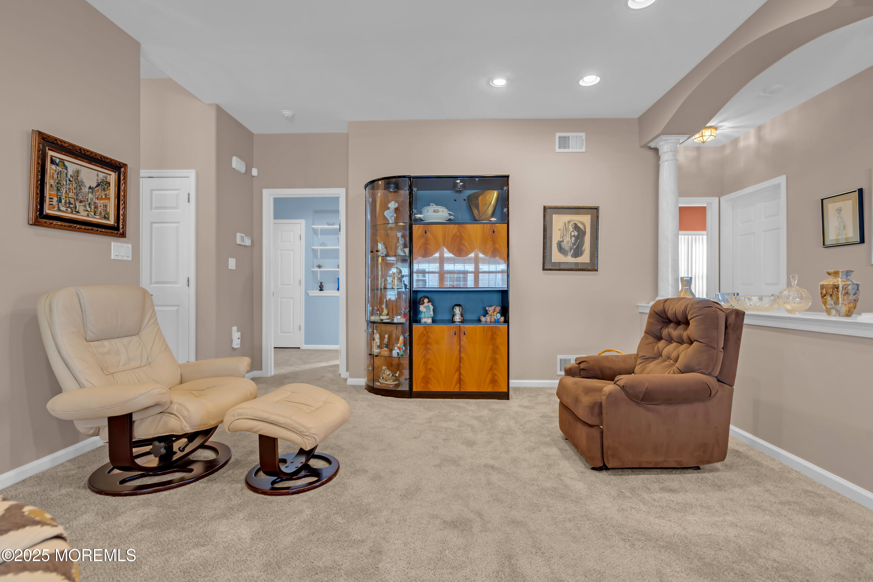 60 Eleanor Road Manchester Township, NJ 08759 - Photo 9 of 45 a living room with furniture and a table