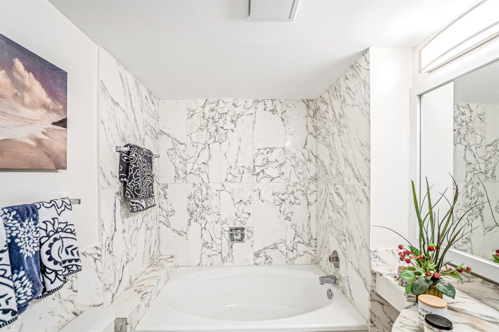 5100 North Ocean Boulevard, Unit 1217 Lauderdale-by-the-Sea, FL 33308 - Photo 14 of 32 a bathroom with a bathtub and shower