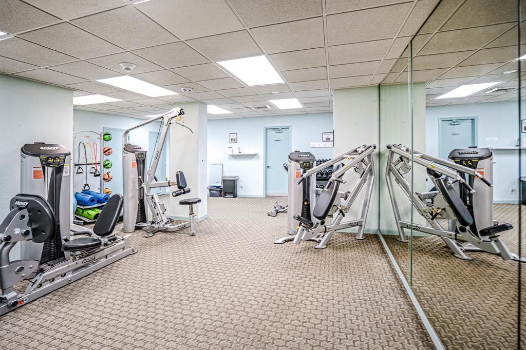 5100 North Ocean Boulevard, Unit 1217 Lauderdale-by-the-Sea, FL 33308 - Photo 24 of 32 a view of a room with gym equipment