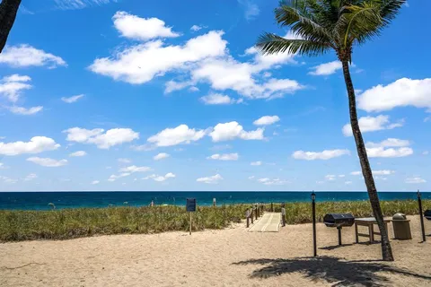 a view of a yard with a lake view