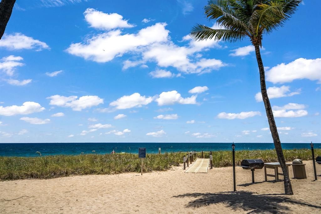 5100 North Ocean Boulevard, Unit 1217 Lauderdale-by-the-Sea, FL 33308 - Photo 27 of 32 a view of a yard with a lake view