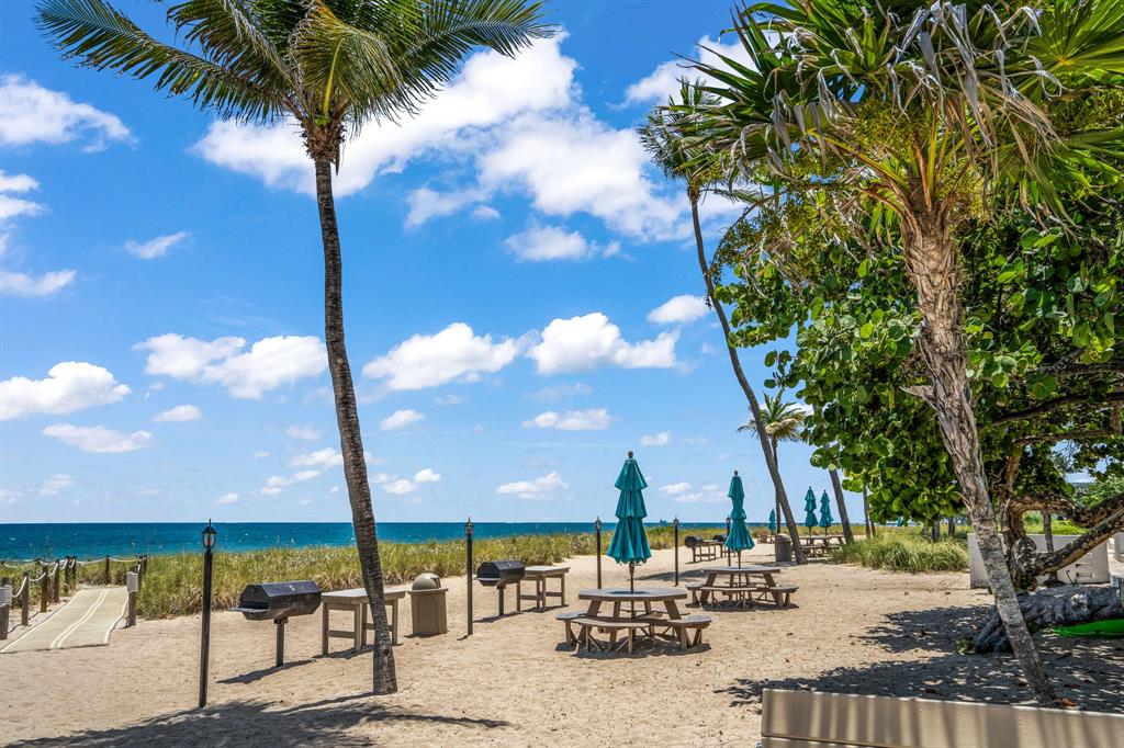 5100 North Ocean Boulevard, Unit 1217 Lauderdale-by-the-Sea, FL 33308 - Photo 28 of 32 a view of swimming pool with a patio