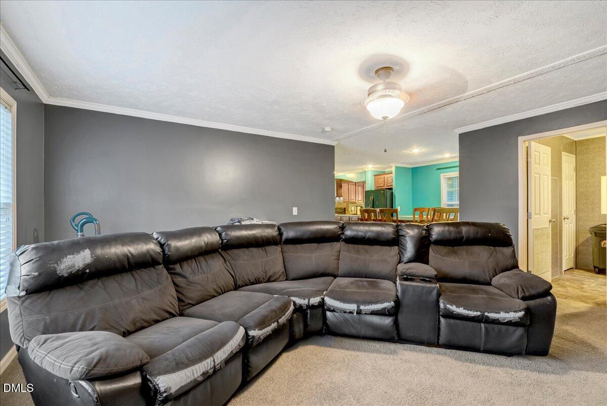 1779 Wise-Five Forks Road Macon, NC 27551 - Photo 11 of 23 a living room with furniture a air conditioner and a window