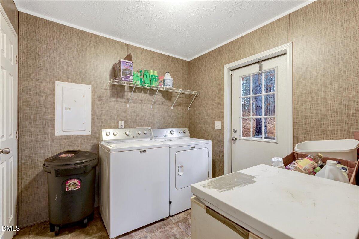 1779 Wise-Five Forks Road Macon, NC 27551 - Photo 13 of 23 a utility room with dryer and washer