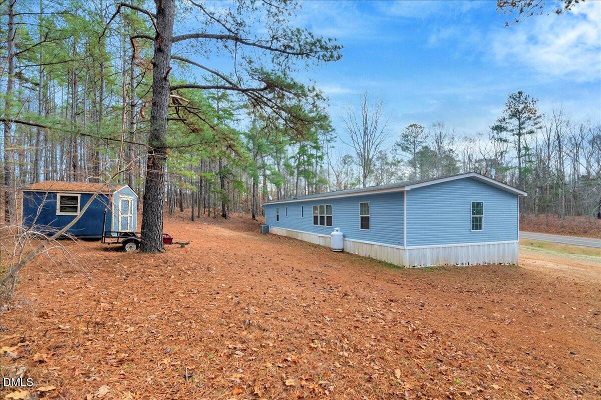 1779 Wise-Five Forks Road Macon, NC 27551 - Photo 21 of 23 a view of a house with a yard